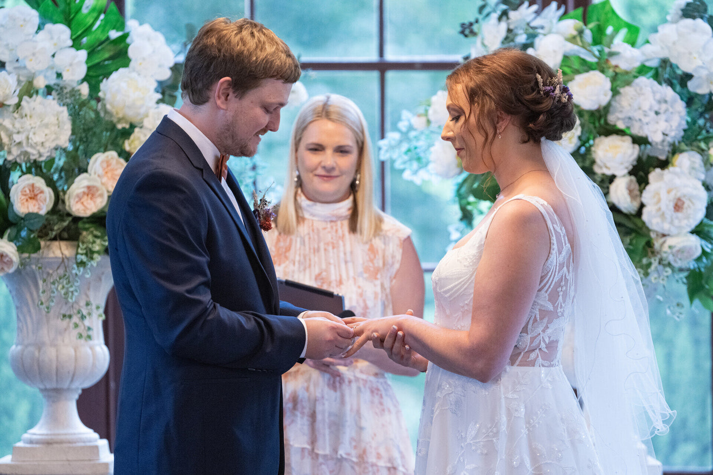 Low bun on our beautiful bride- Hair & Makeup by Natasha