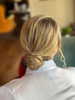 Low tight bun - Hair by Natasha