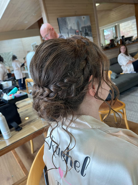 Stunning braided bun with soft curls