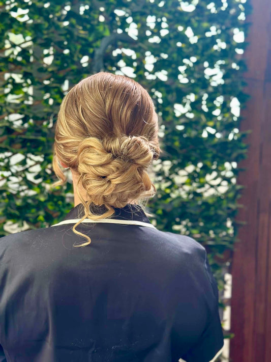 Curled low bun- bridesmaid