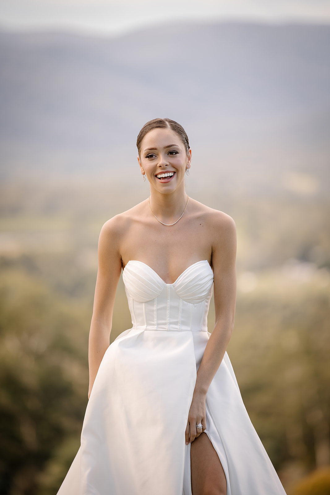 Stunning soft glam and slick low bun