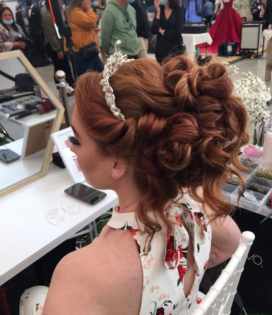Full volume curls pinned high
