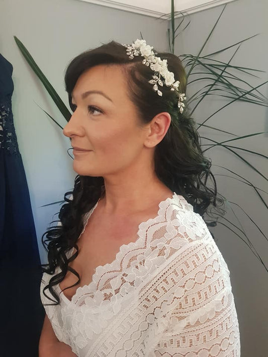 Soft long curls pinned back with Soft Bridal Makeup