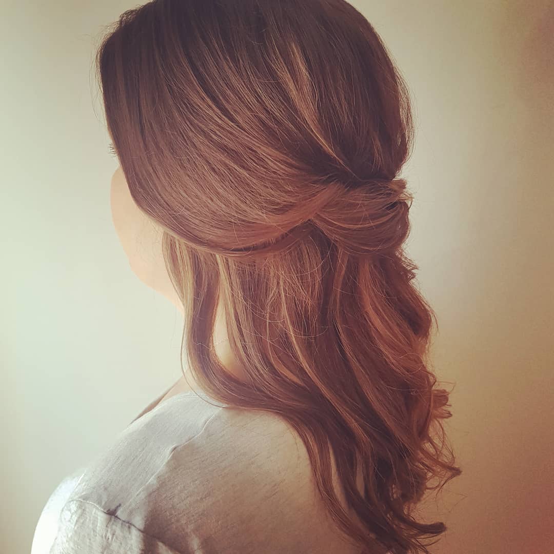 Soft curls pulled back