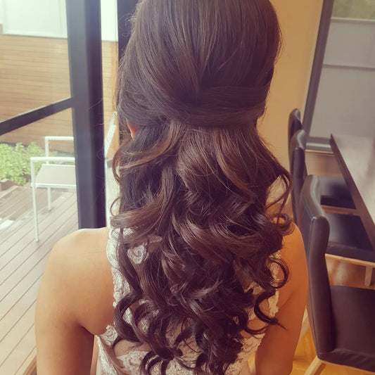Soft curls pinned back