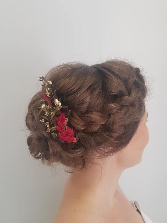 Soft curled bun with side braid