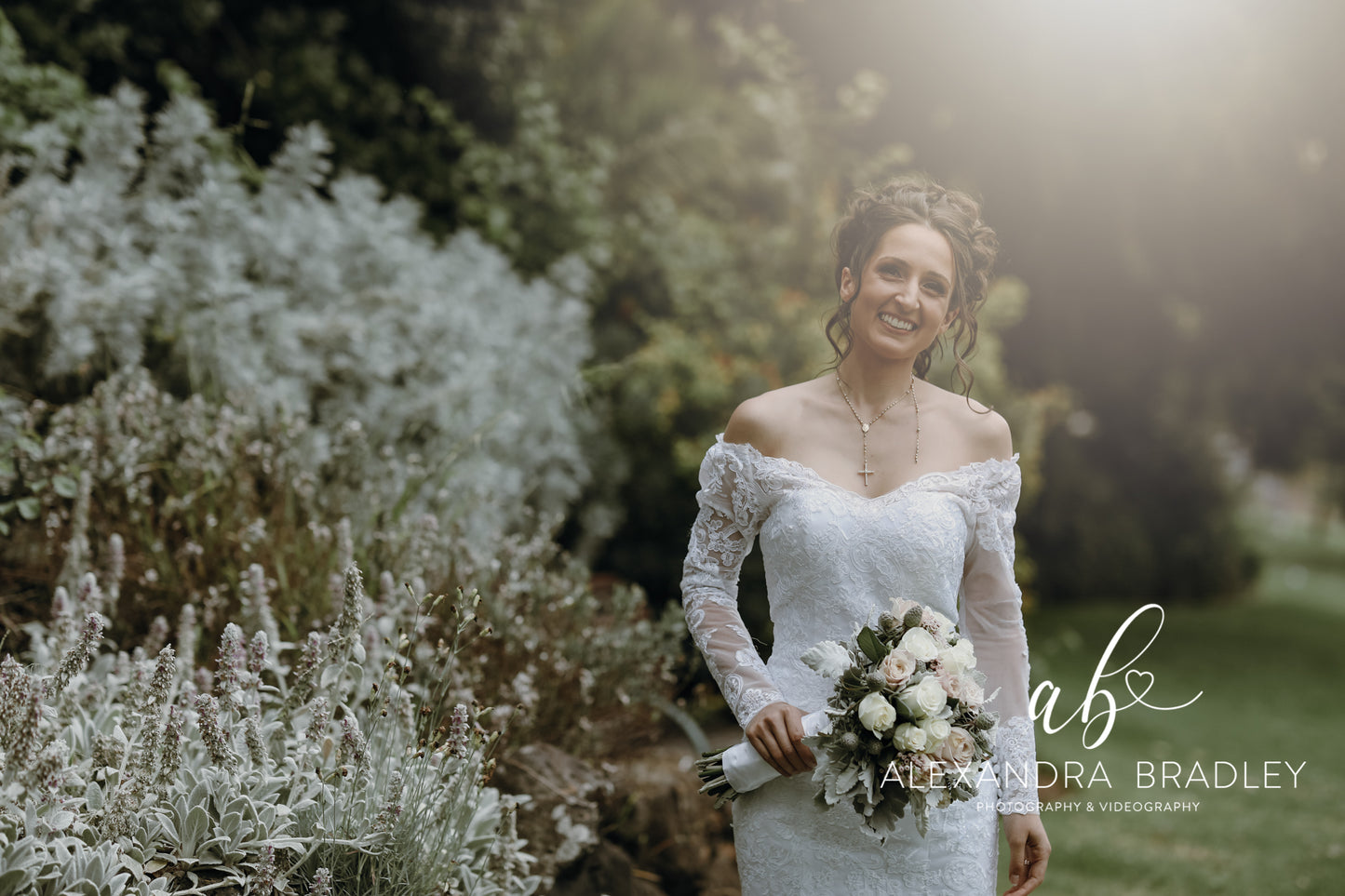 Bridal curly high bun with Bridal Makeup