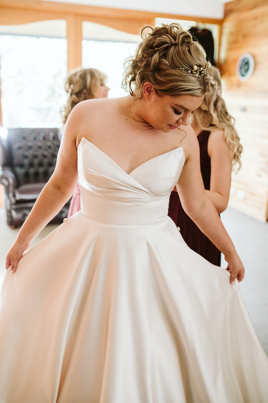 Vintage bridal curls pinned up mid natural bridal makeup