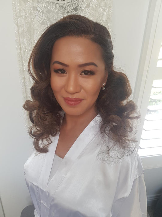 Full coverage makeup with vintage curls